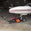 AIRTUG 10-s/h pulling plane in hangar