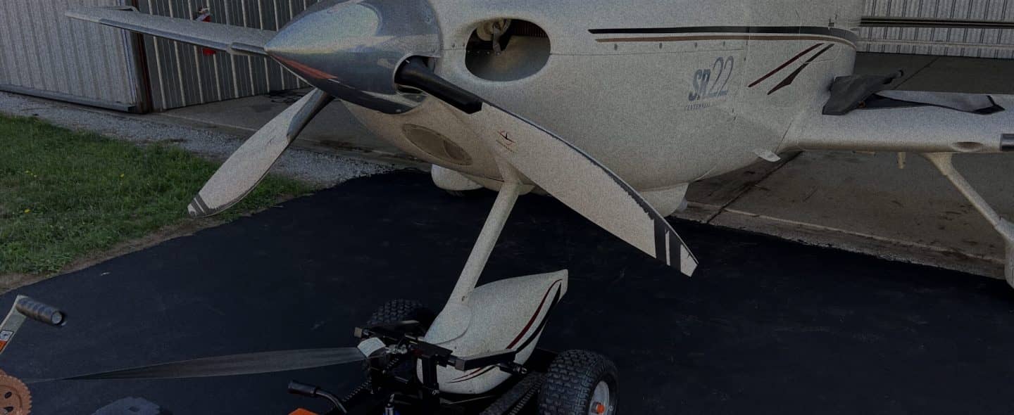 view of airtug attached to a plane