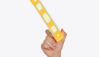 hand holding out a level