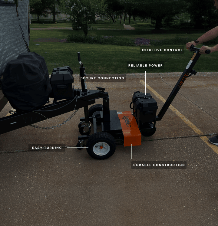 trailer tug attached to trailer with labeling