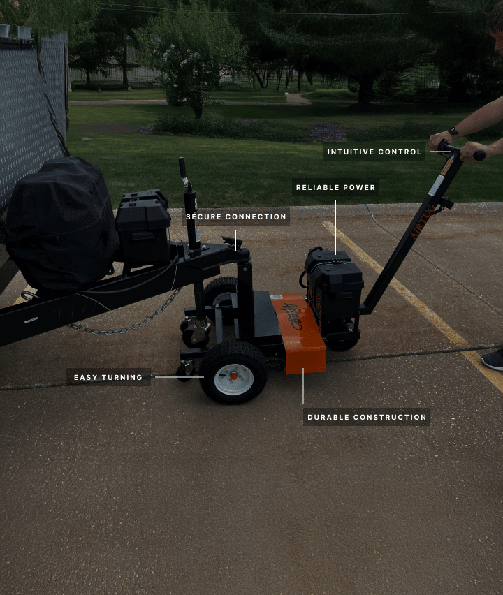 trailer tug attached to trailer with labeling