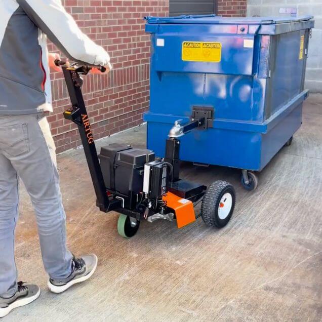 moving dumpster in alley way